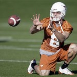 Texas wide receiver Jordan Shipley takes snaps as he holds for place kicking during football practice Tuesday, Dec. 30, 2008, in Scottsdale, Ariz. Texas will play Ohio State in the Fiesta Bowl on Monday, Jan. 5, 2009. (AP Photo/Paul Connors)
