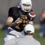 Texas quarterback Colt McCoy participates in throwing drills during football practice Wednesday, Dec. 31, 2008, in Scottsdale, Ariz. Texas will play Ohio State in the Fiesta Bowl NCAA college football game on Monday, Jan. 5, 2009. (AP Photo/Paul Connors)