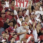A fan holds a sign indicating the year, 1947, that the arizona Cardinals' last hosted a home playoff game, during the first quarter of an NFL wild-card playoff football game against the Atlanta Falcons Saturday, Jan. 3, 2009 in Glendale, Ariz. (AP Photo/Matt York)