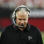 Atlanta Falcons head coach Mike Smith paces the sidelines in the closing moments of the fourth quarter of the Falcons 30-24 loss to the Arizona Cardinals in an NFL wild-card playoff football game on Saturday, Jan. 3, 2009 in Glendale, Ariz. (AP Photo/Ross D. Franklin)