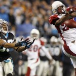 Arizona Cardinals' Dominique Rodgers-Cromartie, right, deflects a pass intended for Carolina Panthers' Steve Smith (89) during the second quarter of an NFL divisional playoff football game in Charlotte, N.C., Saturday, Jan. 10, 2009. (AP Photo/Rick Havner)