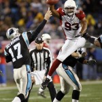 Arizona Cardinals' Calais Campbell (93) leaps as he tries to block a pass by Carolina Panthers quarterback Jake Delhomme (17) during the second quarter of an NFL divisional playoff football game in Charlotte, N.C., Saturday, Jan. 10, 2009. (AP Photo/Rick Havner)