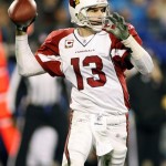 Arizona Cardinals' Kurt Warner (13) throws a pass during the third quarter of the Cardinals' 33-13 win in an NFL divisional playoff football game in Charlotte, N.C., Saturday, Jan. 10, 2009. (AP Photo/Rick Havner)
