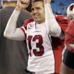 Arizona Cardinals quarterback Kurt Warner (13) reacts in the closing minutes of the Cardinals' 33-13 win over the Carolina Panthers in an NFL divisional playoff football game in Charlotte, N.C., Saturday, Jan. 10, 2009. (AP Photo/Rick Havner)