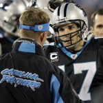 Carolina Panthers quarterback Jake Delhomme (17) listens on the sidelines after throwing an interception during the fourth quarter against the Arizona Cardinals in an NFL divisional playoff football game in Charlotte, N.C., Saturday, Jan. 10, 2009. (AP Photo/Chuck Burton)