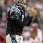 Carolina Panthers quarterback Jake Delhomme reacts during the third quarter against the Arizona Cardinals in an NFL divisional playoff football game in Charlotte, N.C., Saturday, Jan. 10, 2009. (AP Photo/Gerry Broome)