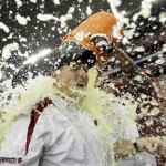 Arizona Cardinals head coach Ken Whisenhunt is showered at the end of the NFL NFC championship football game against the Philadelphia Eagles Sunday, Jan. 18, 2009, in Glendale, Ariz. The Cardinals won 32-25. (AP Photo/David J. Phillip)