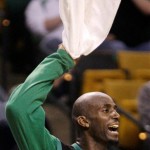 Boston Celtics forward Kevin Garnett (5) waves a towel from the bench during the second half of an NBA basketball game against the Phoenix Suns in Boston, Monday, Jan. 19, 2009. The Celts beat the Suns 104-87. (AP Photo/Charles Krupa)
