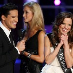 Host Mario Lopez, left, asks a question of Miss Indiana Katie Stam, right, during the Miss America 2009 competition in Las Vegas on Saturday, Jan. 24, 2009. (AP Photo/Isaac Brekken)