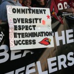 Arizona Cardinals fans hold up signs at a Super Bowl XLIII sendoff rally for the team at Phoenix Sky Harbor Airport Monday, January 26, 2009. (Jim Cross/KTAR)
