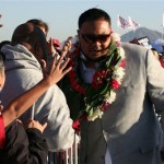 Arizona Cardinals offensive lineman Deuce Lutui mixes it up with fans gathered at a sendoff rally for the team at Phoenix Sky Harbor Airport on Monday, January 26, 2009. The Cardinals are headed to Super Bowl XLIII in Tampa, Florida. (KTAR)