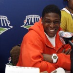 Arizona Cardinals' Adrian Wilson laughs as he answers a question during player news conferences at the hotel where the team is staying Monday, Jan. 26, 2009, in Tampa, Fla. The Cardinals will face the Pittsburgh Steelers in the NFL football Super Bowl XLIII in Tampa on Sunday. (AP Photo/Ross D. Franklin)