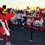 Thousands of Arizona Cardinals' fans gathered at Phoenix Sky Harbor Airport Monday morning to give their team a sendoff to Super Bowl XLIII. (Rose Clements/KTAR)