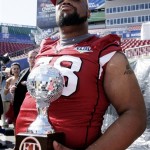 Arizona Cardinals defensive tackle Alan Branch holds a trophy presented to him during the team's media day for Super Bowl XLIII Tuesday, Jan. 27, 2009, in Tampa, Fla. The Cardinals will play the Pittsburgh Steelers in the NFL Super Bowl football game on Sunday, Feb. 1. (AP Photo/Ross D. Franklin)