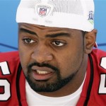 Arizona Cardinals linebacker Karlos Dansby speaks to reporters during the team's media day for Super Bowl XLIII Tuesday, Jan. 27, 2009, in Tampa, Fla. The Cardinals will play the Pittsburgh Steelers in the NFL Super Bowl football game on Sunday, Feb. 1. (AP Photo/Ross D. Franklin)