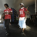Arizona Cardinals' Edgerrin James, left, and Anquan Boldin (81) arrive at morning player news conference at the team hotel Wednesday, Jan. 28, 2009, in Tampa, Fla. The Cardinals will face the Pittsburgh Steelers in Super Bowl XLIII in Tampa, on Sunday. (AP Photo/Ross D. Franklin)