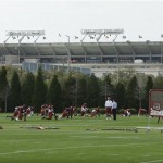 Just a short distance from the site of Super Bowl XLIII, the Arizona Cardinals warm up during afternoon practice at the Tampa Bay Buccaneers training facility Wednesday, Jan. 28, 2009, in Tampa, Fla. The Cardinals will face the Pittsburgh Steelers in Tampa, on Sunday. (AP Photo/Ross D. Franklin)