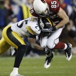 Arizona Cardinals wide receiver Jerheme Urban pulls in a pass as Pittsburgh Steelers safety Ryan Clark defends during the fourth quarter of the NFL Super Bowl XLIII football game, Sunday, Feb. 1, 2009, in Tampa, Fla. (AP Photo/Amy Sancetta)