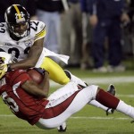 Pittsburgh Steelers cornerback William Gay (22) tackles Arizona Cardinals wide receiver Steve Breaston (15) during the fourth quarter of the NFL Super Bowl XLIII football game, Sunday, Feb. 1, 2009, in Tampa, Fla. (AP Photo/Eric Gay)