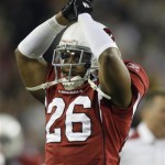 Arizona Cardinals cornerback Roderick Hood signals back to the bench that the Cardinals scored a safety against the Pittsburgh Steelers because of a holding penalty in the end zone in the fourth quarter the NFL Super Bowl XLIII football game, Sunday, Feb. 1, 2009, in Tampa, Fla. (AP Photo/Winslow Townson)