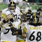 Pittsburgh Steelers quarterback Ben Roethlisberger (7) celebrates his touchdown pass to Pittsburgh Steelers wide receiver Santonio Holmes during the fourth quarter of the NFL Super Bowl XLIII football game, Sunday, Feb. 1, 2009, in Tampa, Fla. (AP Photo/Eric Gay)