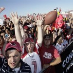 Arizona Cardinals supporters cheer as the team's charter plane touches down upon arrival from the NFL Super Bowl XLIII football game, Monday, Feb. 2, 2009 in Phoenix. The Cardinals lost to the Pittsburgh Steelers in the Super Bowl on Sunday. (AP Photo/Paul Connors)