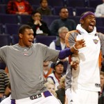 Phoenix Suns Leandro Barbosa, left of Brazil and Amar'e Stoudemire react on a block shot against the Sacramento Kings during the fourth quarter of an NBA basketball game on Monday, Feb. 2, 2009, in Phoenix. (AP Photo/Rick Scuteri)