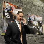 Auburn coach Gene Chizik talks to Auburn signee Jamar Travis after Travis faxed in his National Letter of Intent to play college football at Auburn on Wednesday, Feb. 4, 2009 in Auburn, Ala. (AP Photo/Todd J. Van Emst)