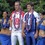 Indianapolis Colts' quarterback Peyton Manning, second left, and his brother New York Giants' quarterback Eli Manning pose with hula dancers before football practice at the Ko Olina Resort in Kapolei, Hawaii, Friday Feb. 6, 2009, in preparation for the Pro Bowl football game this Sunday. (AP Photo/Ronen Zilberman)