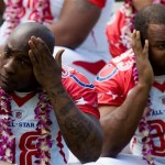Indianapolis Colts teammates Robert Mathis, left, and Dwight Freeney await their turn to have their photos taken during the AFC Pro Bowl NFL football team photo session at the Ihilani Resort and Spa, Friday, Feb. 6, 2009, in Kapolei, Hawaii. (AP Photo/Marco Garcia)