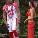 Baltimore Ravens linebacker Brendon Ayanbadejo, left, talks with a model at the AFC Pro Bowl NFL football team photo session at the Ihilani Resort and Spa, Friday, Feb. 6, 2009, in Kapolei, Hawaii. (AP Photo/Marco Garcia)