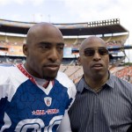 Tampa Bay cornerback Ronde Barber, left, and his brother, former running back for the New York Giants, Tiki Barber, appear before the start of the Pro Bowl football game at Aloha Stadium, Sunday, Feb. 8, 2009, in Honolulu. (AP Photo/Marco Garcia)
