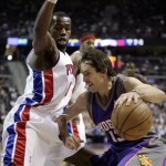 Phoenix Suns guard Steve Nash, right, drives to the basket as Detroit Pistons guard Rodney Stuckey defends in the first half of an NBA basketball game Sunday, Feb. 8, 2009, in Auburn Hills, Mich. (AP Photo/Duane Burleson)