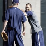 Cleveland Indians infielder Mark DeRosa, right, shares a laugh with pitcher Kerry Wood on reporting day for pitchers and catchers at spring training baseball Thursday, Feb 12, 2009, in Goodyear, Ariz. (AP Photo/Paul Connors)