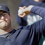 Seattle Mariners pitcher Ryan Rowland-Smith throws on the first day of baseball spring training Saturday, Feb. 14, 2009 in Peoria, Ariz. (AP Photo/Charlie Riedel)