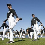 Toronto Blue Jays pitchers and catchers warm up during a spring training baseball workout in Dunedin, Fla., Tuesday, Feb. 17, 2009. (AP Photo/The Canadian Press,Mike Carlson)