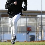 Toronto Blue Jays pitcher Roy Halladay participates in a fielding drill during a spring training baseball workout in Dunedin, Fla., Tuesday, Feb. 17, 2009. (AP Photo/The Canadian Press, Mike Carlson)