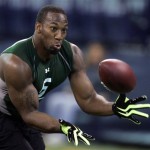 Former Wake Forest linebacker Aaron Curry runs a football drill at the NFL scouting combine in Indianapolis, Monday, Feb. 23, 2009. (AP Photo/Michael Conroy)