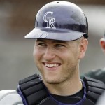Colorado Rockies catcher Chris Iannetta smiles as he waits for a drill to begin Monday, Feb. 23, 2009, during baseball spring training in Tucson, Ariz. (AP Photo/Elaine Thompson)