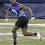 Ohio State defensive back Malcolm Jenkins runs a drill at the NFL football scouting combine in Indianapolis, Tuesday, Feb. 24, 2009. (AP Photo/Darron Cummings)