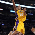 Los Angeles Lakers guard Kobe Bryant goes up for a shot during the first half of their NBA basketball game against the Phoenix Suns, Thursday, Feb. 26, 2009, in Los Angeles. (AP Photo/Mark J. Terrill)