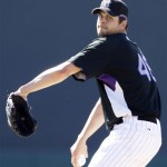 Colorado Rockies pitcher Jason Hirsh throws against the Chicago White Sox in the first inning Thursday, Feb. 26, 2009, during their spring training opening baseball game in Tucson, Ariz. (AP Photo/Elaine Thompson)