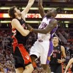 Phoenix Suns Jason Richardson (23) has his shot blocked by Toronto Raptors Andrea Bargnani of Italy in the second quarter of an NBA basketball game in Phoenix on Friday, Feb. 27, 2009. (AP Photo/Aaron J. Latham)