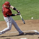 Arizona Diamondbacks' Chris Snyder hits a three-run home run during the fourth inning of a spring training baseball game against the Chicago Cubs on Monday, March 2, 2009, in Mesa, Ariz. (AP Photo/Morry Gash)