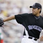 Colorado Rockies pitcher Jorge De La Rosa gets the ball back after a pitch against Mexico Thursday, March 5, 2009, during an exhibition spring baseball game in Tucson, Ariz. (AP Photo/Elaine Thompson)