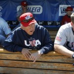 United States' Adam Dunn, left and Chipper Jones, right, flank manger Davey Johnson before their exhibition spring baseball game against the Philadelphia Phillies in Clearwater, Fla., Thursday, March 5, 2009. (AP Photo/Kathy Willens)
