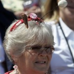 Patty Kelso, 74, from Plant City, Fla., waits for the Cincinnati Reds to take the field before the they play the Pittsburgh Pirates in a spring training baseballgame, Thursday, March 5, 2009, in Sarasota, Fla. (AP Photo/Tony Dejak)
