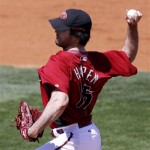 Arizona Diamondbacks starting pitcher Dan Haren works the first inning against the Los Angeles Angels Saturday, March 7, 2009, during an exhibition spring baseball game in Tucson, Ariz. (AP Photo/Ed Andrieski)
