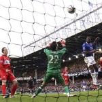 Everton's Louis Saha, 2nd right, heads to score a goal past Middlesbrough keeper Bradley Jones, number 22, during their quarter final FA Cup soccer match at Goodison Park Stadium, Liverpool, England, Sunday, March 8, 2009. (AP Photo /Paul Thomas)