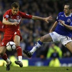 Everton's Leon Osman, right, vies with Middlesbrough's Gary O'Neil during their quarter final FA Cup soccer match at Goodison Park Stadium, Liverpool, England, Sunday, March 8, 2009. (AP Photo/Paul Thomas)